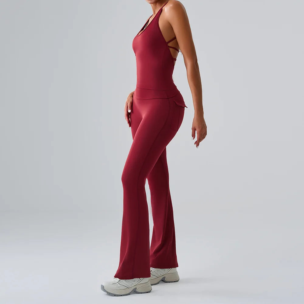 Women's red workout set with high-waist leggings and matching sports bra, designed for comfort during yoga, gym, and training sessions