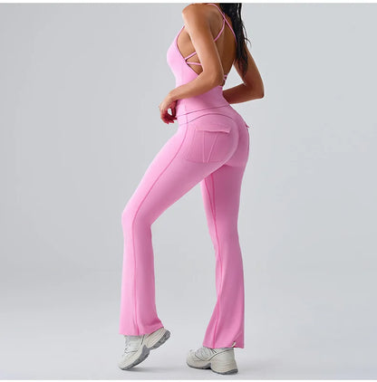 Women's vibrant pink fitness set with supportive sports bra and full-length leggings, designed for comfortable gym sessions and yoga practice