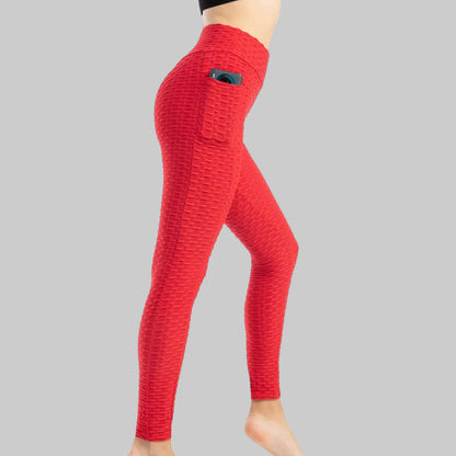 Red textured leggings with a pocket on a white background