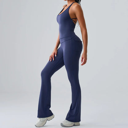 Women's blue fitness set with supportive sports bra and full-length leggings, perfect for gym, yoga, and all-day workout comfort